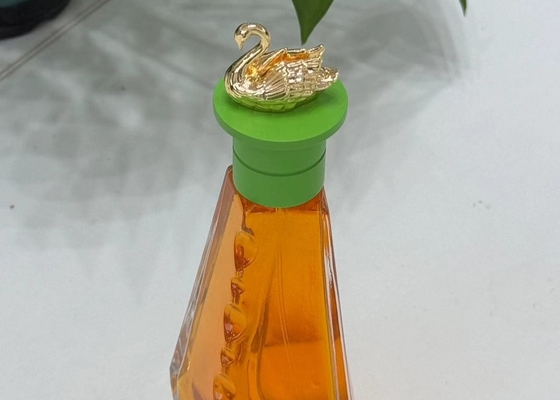 주문 다채로운 백조 모양의 Zamak 향수 모자 고급 금속 향수 병 상자 online manufacture